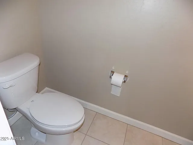 a view of a bathroom from the hallway