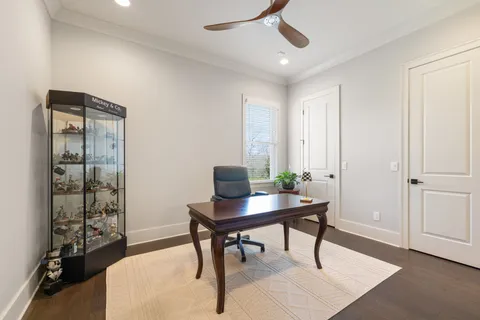 a workspace with furniture and a window