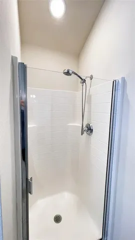 a view of a room with racks on the wall