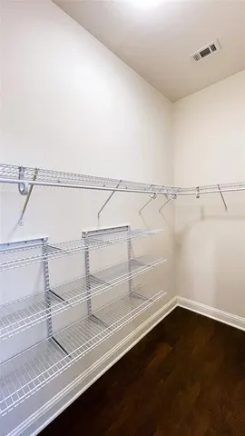 a view of small space with racks on the wall