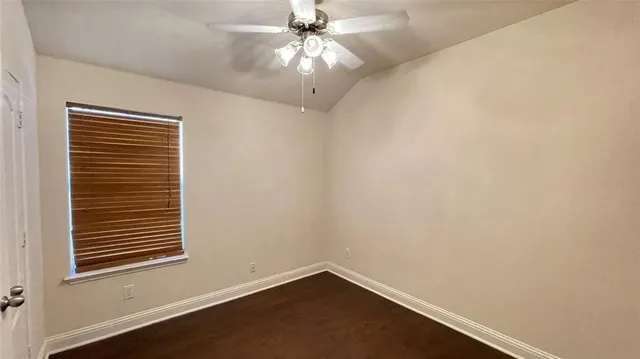 a view of a small space with racks on the wall