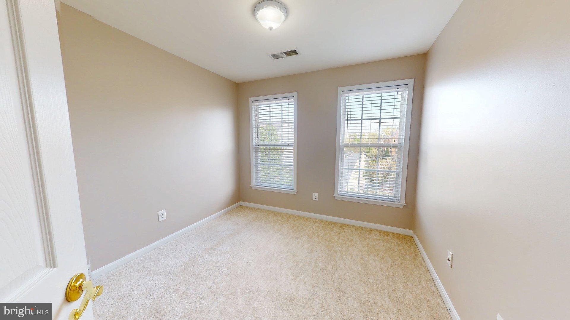 41867 Cinnabar Square Aldie, VA 20105 - Photo 15 of 26 a view of an empty room with a window