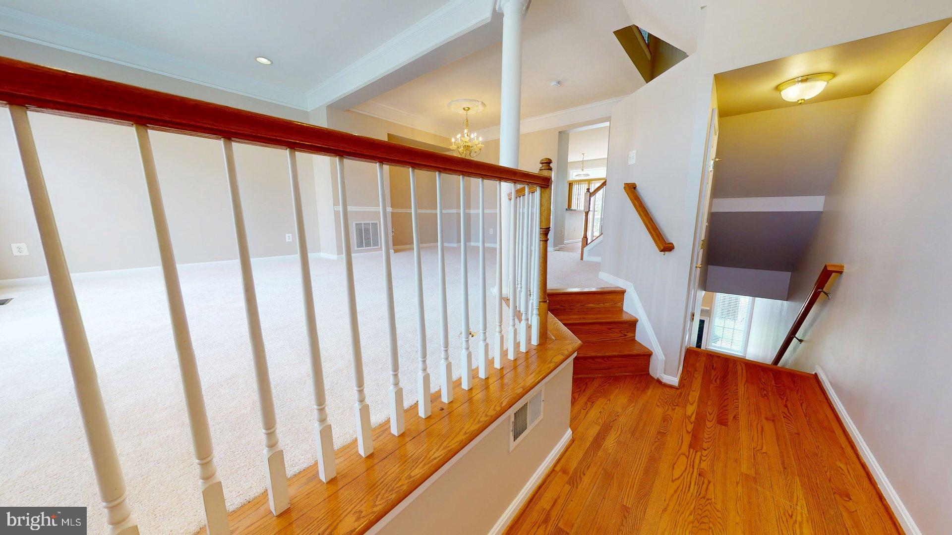 41867 Cinnabar Square Aldie, VA 20105 - Photo 2 of 26 a view of entryway with wooden floor