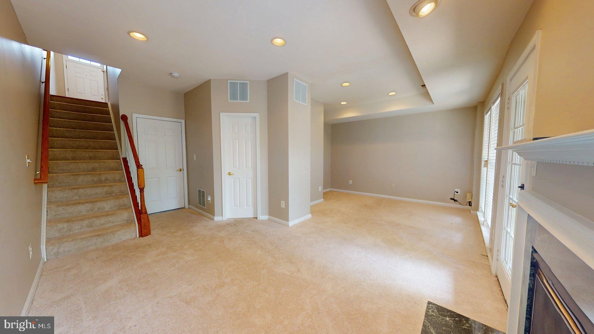 41867 Cinnabar Square Aldie, VA 20105 - Photo 22 of 26 a view of an empty room with stairs and ventilation
