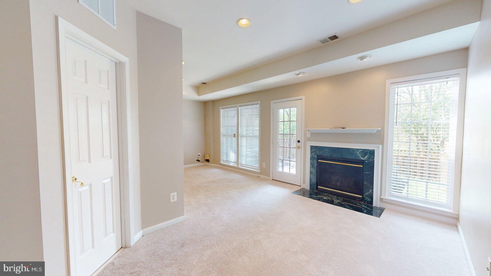 41867 Cinnabar Square Aldie, VA 20105 - Photo 24 of 26 a view of empty room with fireplace