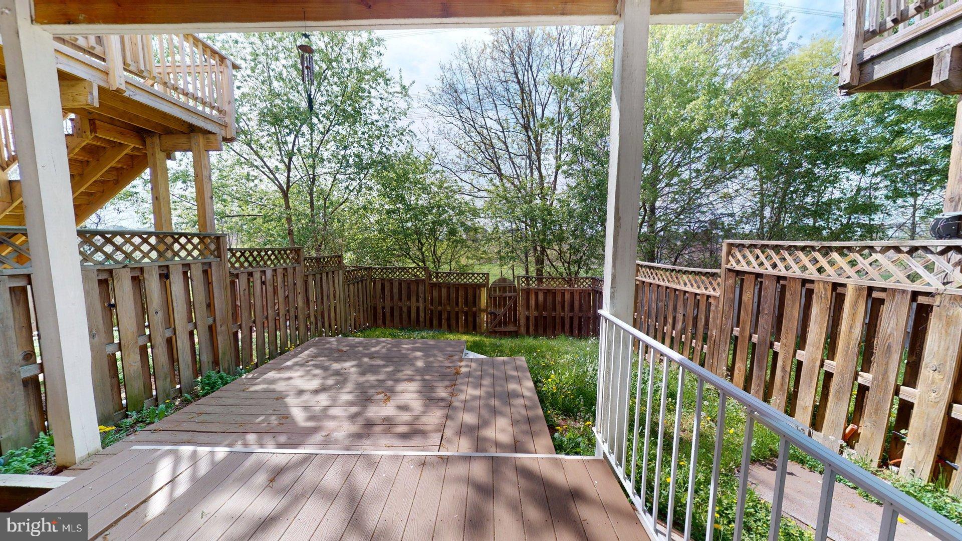 41867 Cinnabar Square Aldie, VA 20105 - Photo 25 of 26 a balcony with trees in front of it