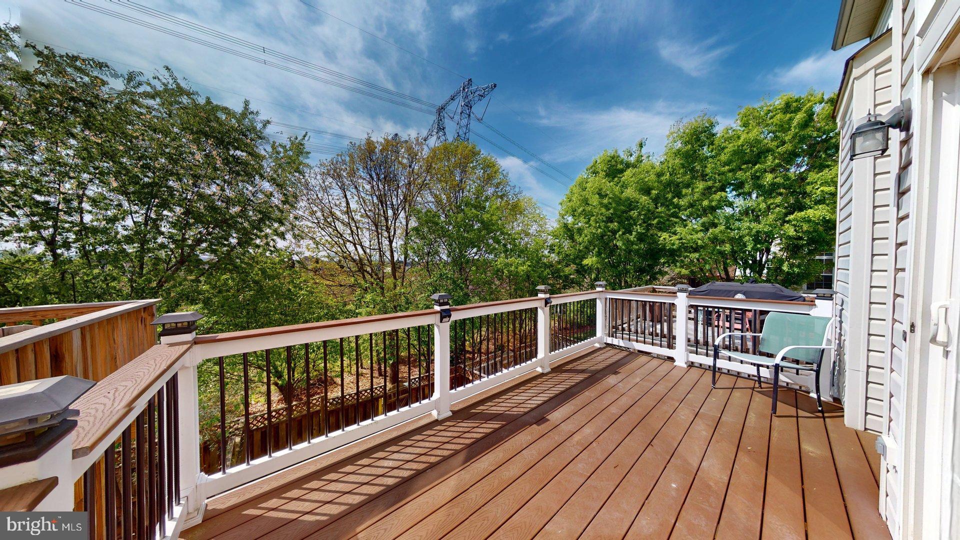 41867 Cinnabar Square Aldie, VA 20105 - Photo 26 of 26 a view of balcony with deck and wooden floor
