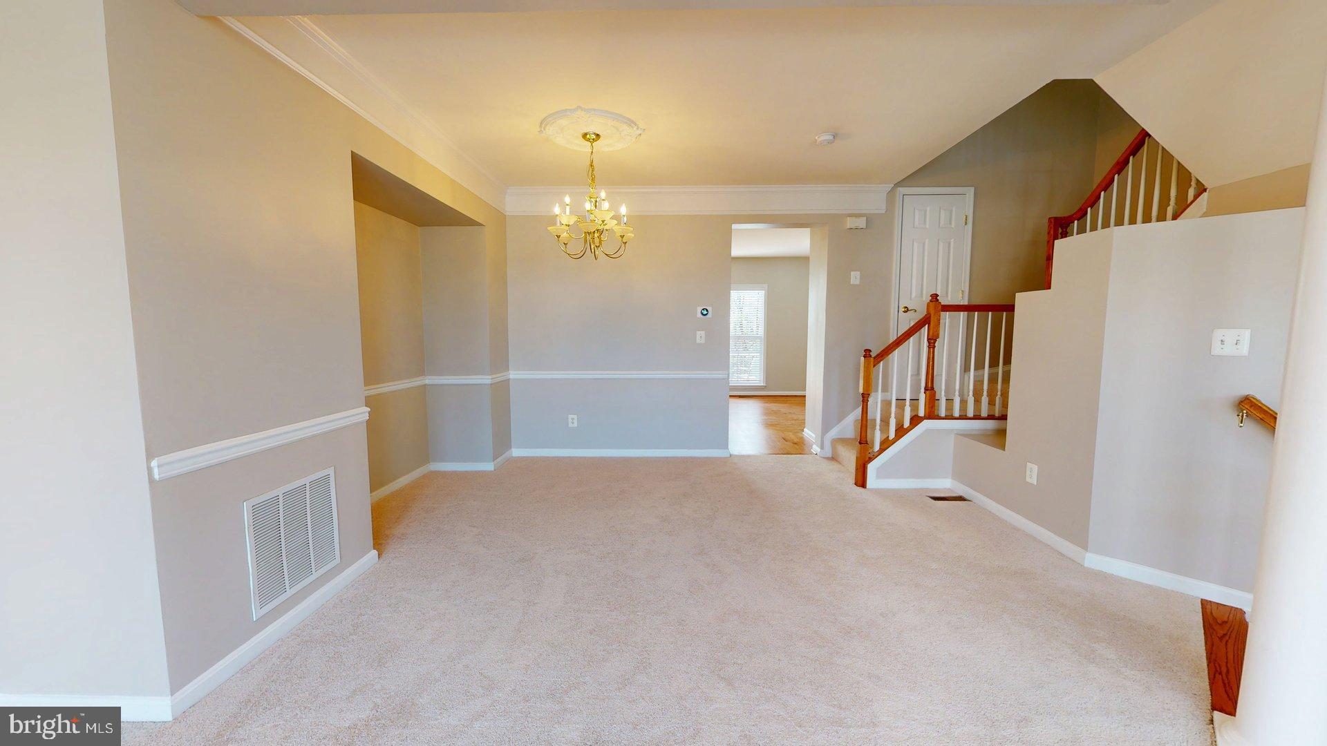 41867 Cinnabar Square Aldie, VA 20105 - Photo 5 of 26 a view of a livingroom with a furniture and a ceiling fan