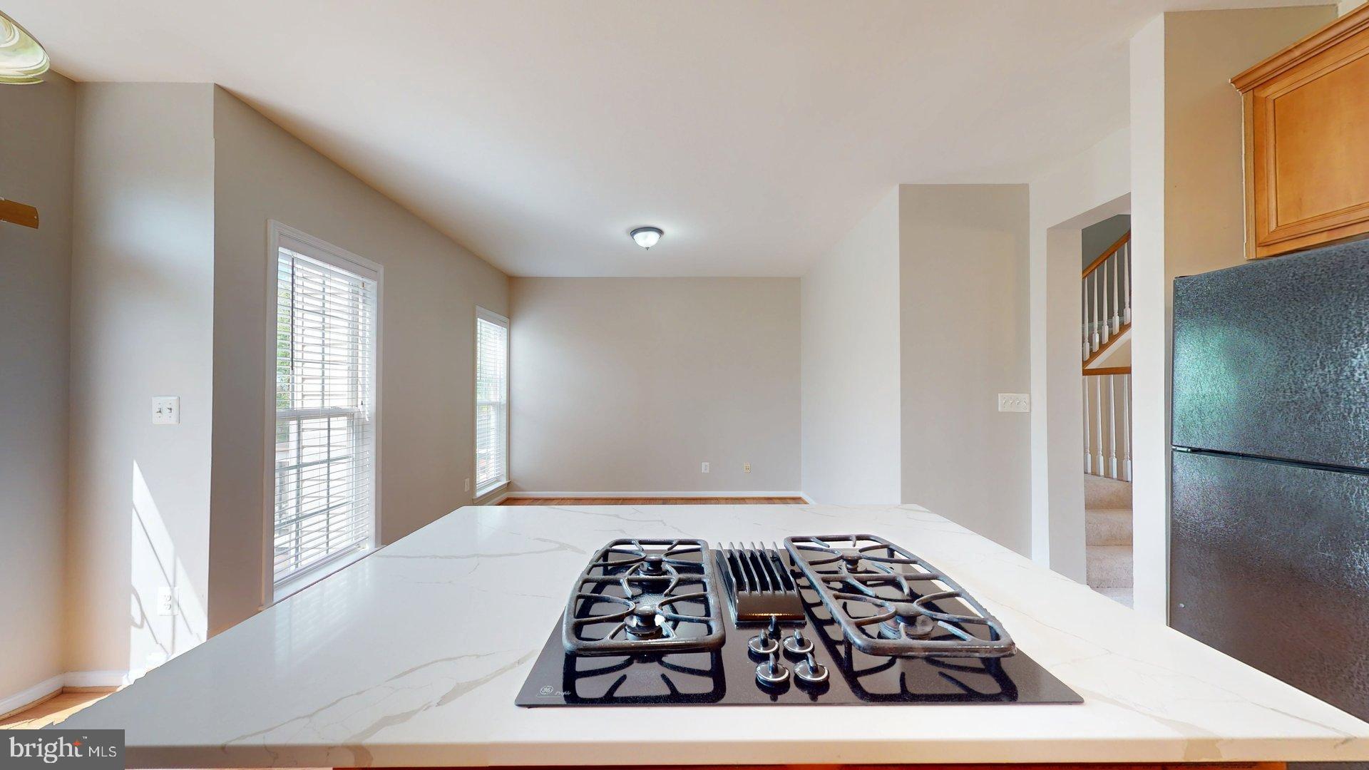 41867 Cinnabar Square Aldie, VA 20105 - Photo 9 of 26 a bedroom with a bed and a window