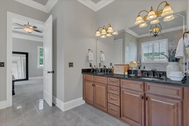a view of a hallway with a white walls and stairs