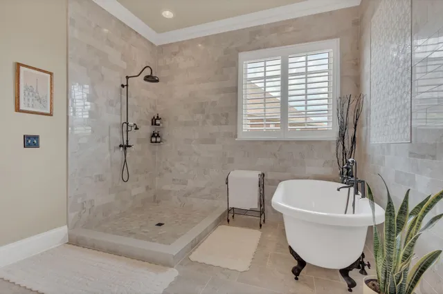 a living room with furniture and white walls