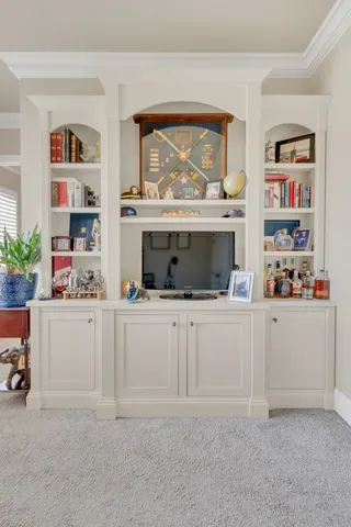 a bathroom with a sink vanity and a mirror