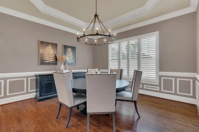 a view of a livingroom with furniture and wooden floor