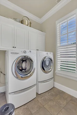 a kitchen with stainless steel appliances granite countertop wooden cabinets a stove top oven a sink and dishwasher