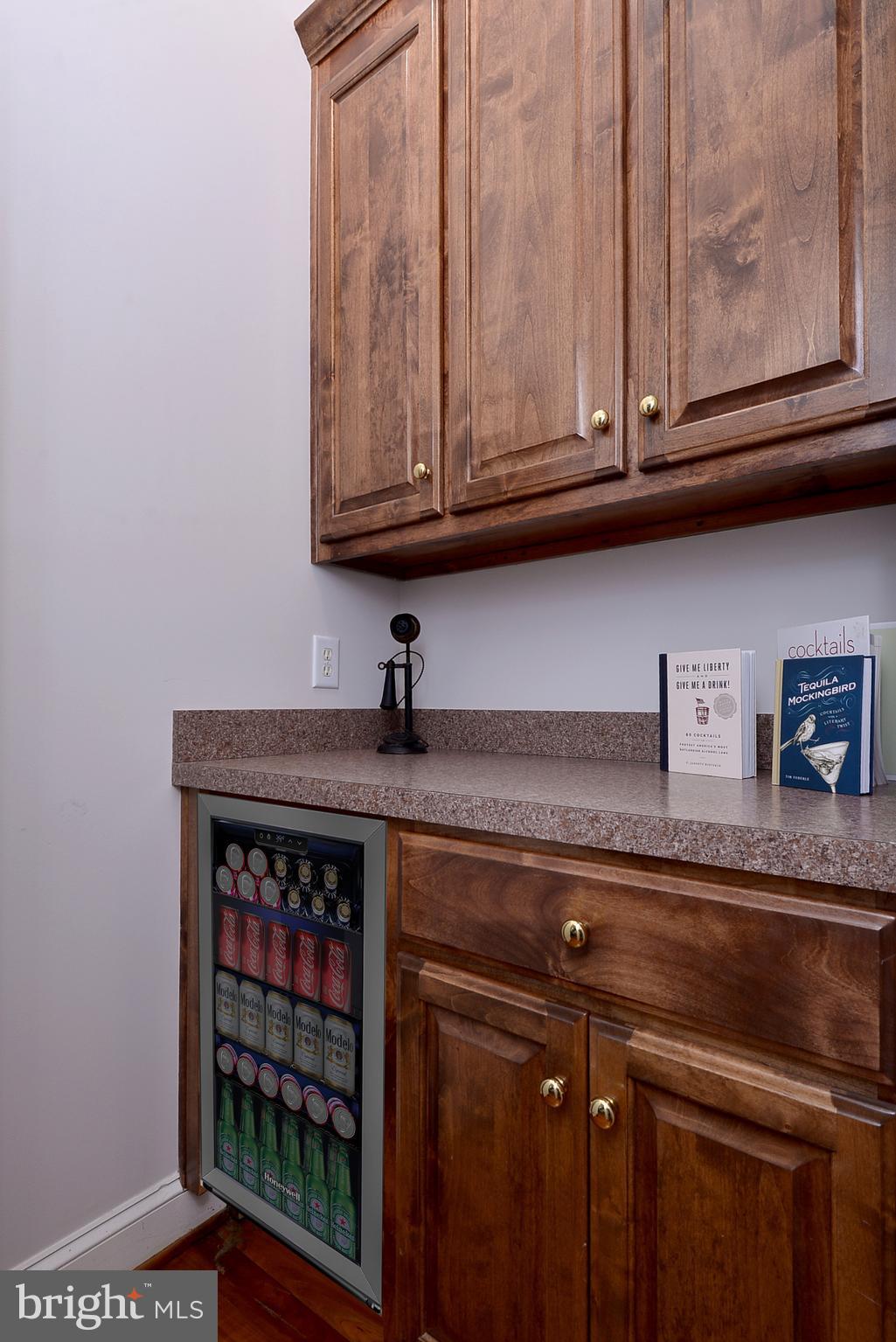 2076 Harpers Mill Road Williamsburg, VA 23185 - Photo 15 of 63 a kitchen with stainless steel appliances granite countertop a sink a stove and cabinets