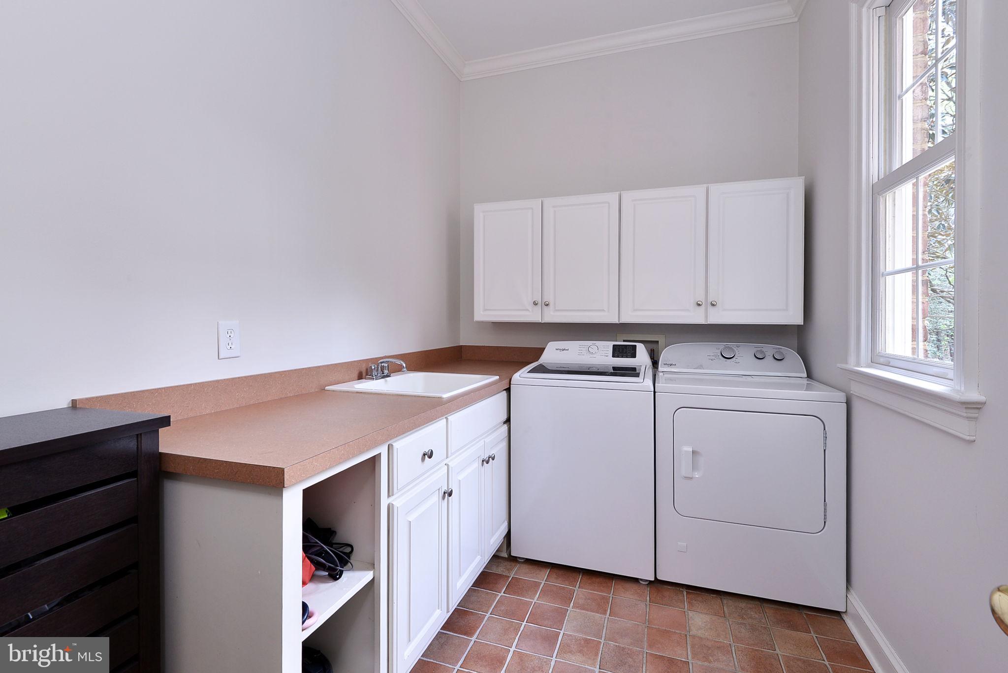 2076 Harpers Mill Road Williamsburg, VA 23185 - Photo 18 of 63 a utility room with dryer and washer