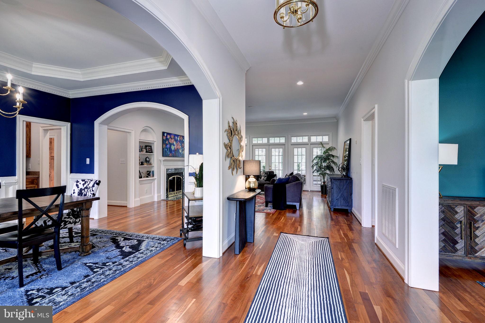 2076 Harpers Mill Road Williamsburg, VA 23185 - Photo 4 of 63 a view of a living room and dining room