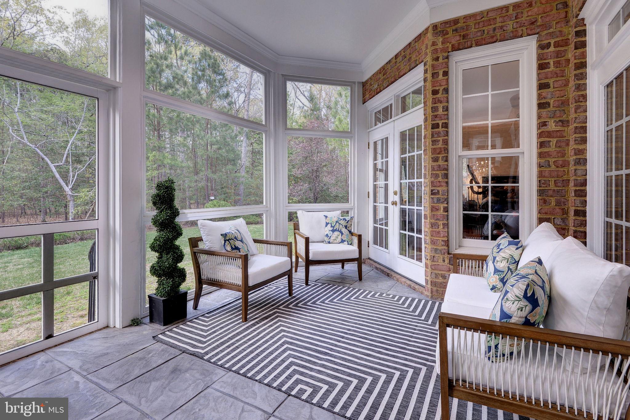 2076 Harpers Mill Road Williamsburg, VA 23185 - Photo 42 of 63 a living room with furniture and a window