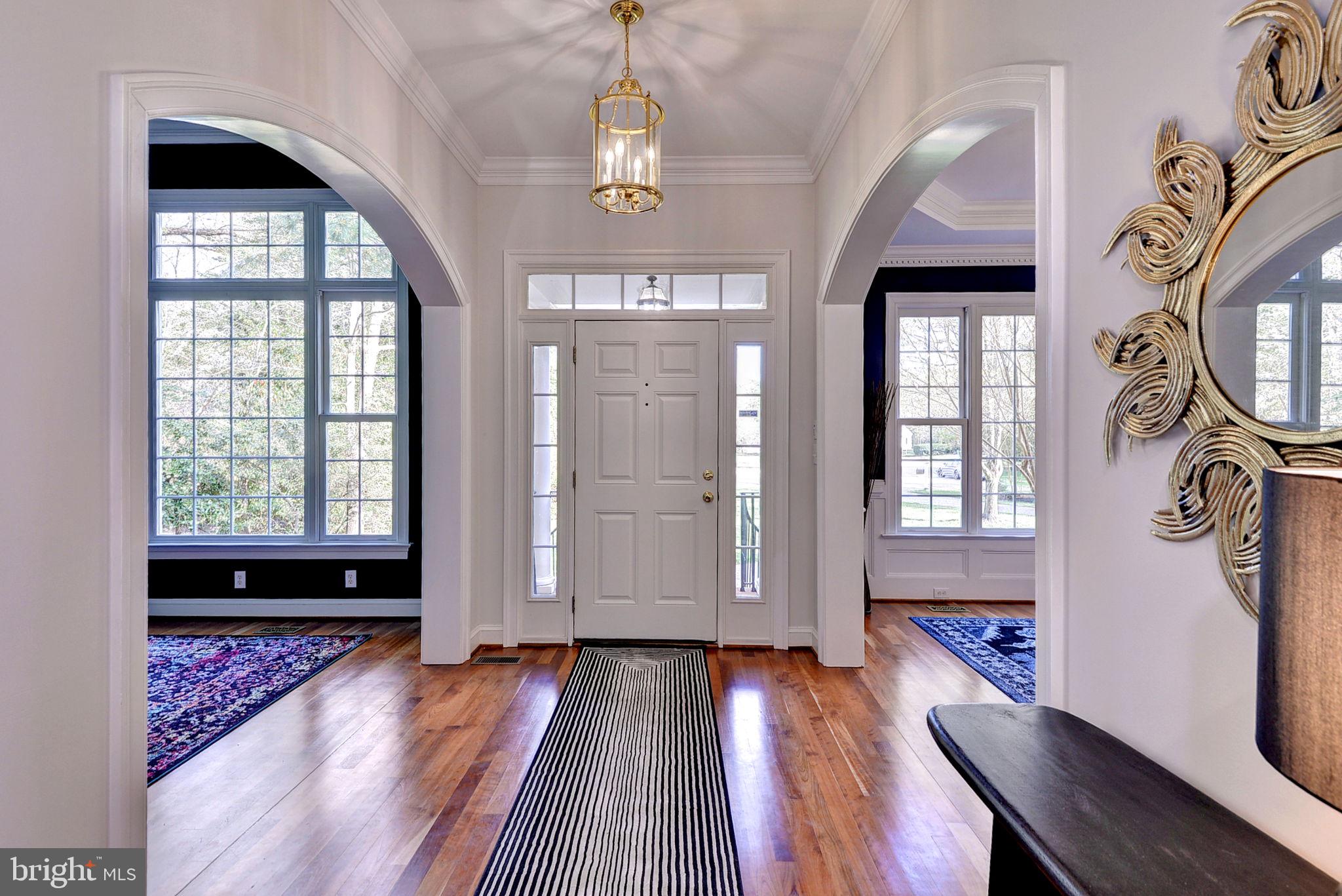 2076 Harpers Mill Road Williamsburg, VA 23185 - Photo 5 of 63 a view of empty room with wooden floor and fan