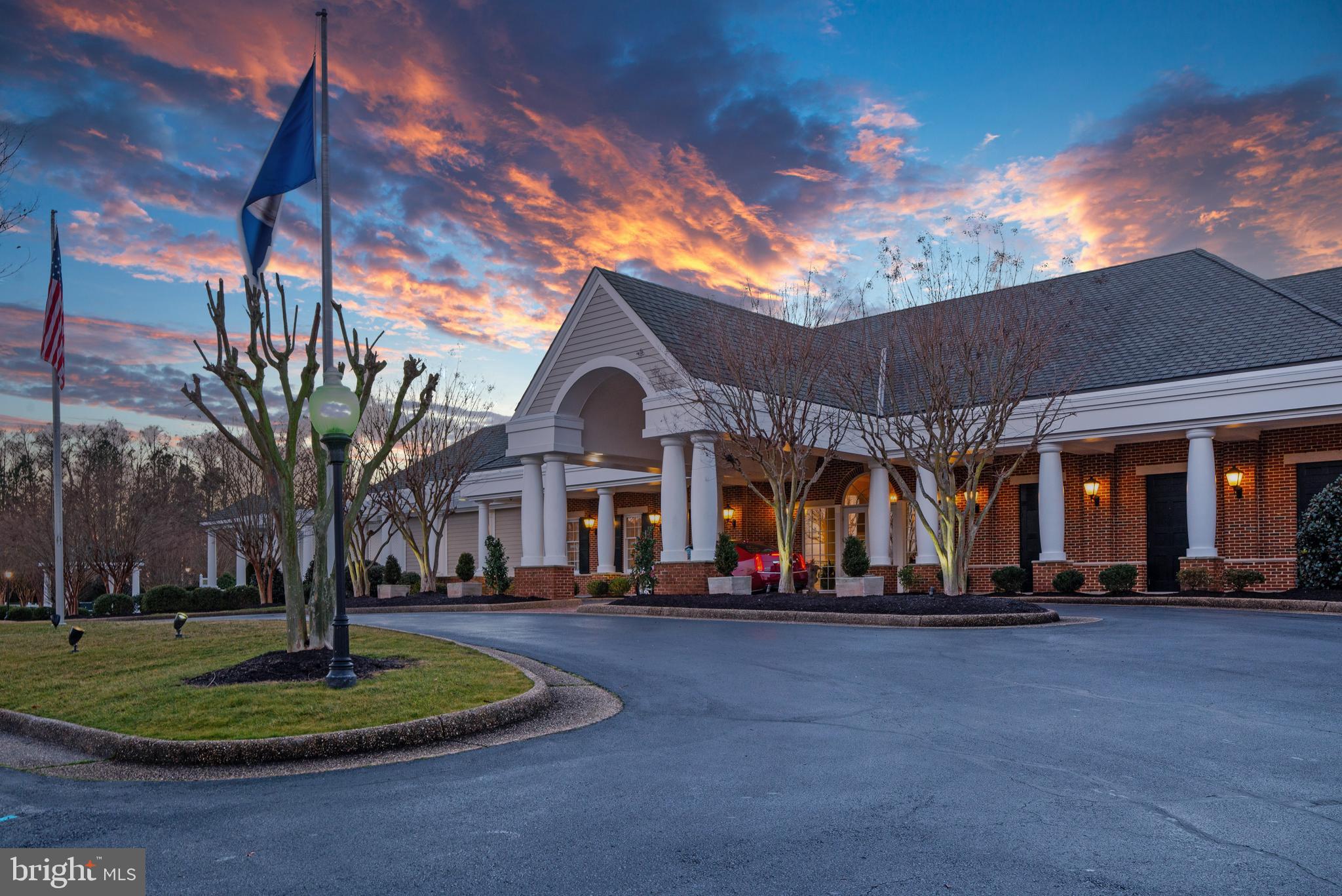 2076 Harpers Mill Road Williamsburg, VA 23185 - Photo 51 of 63 a front view of a house with a yard