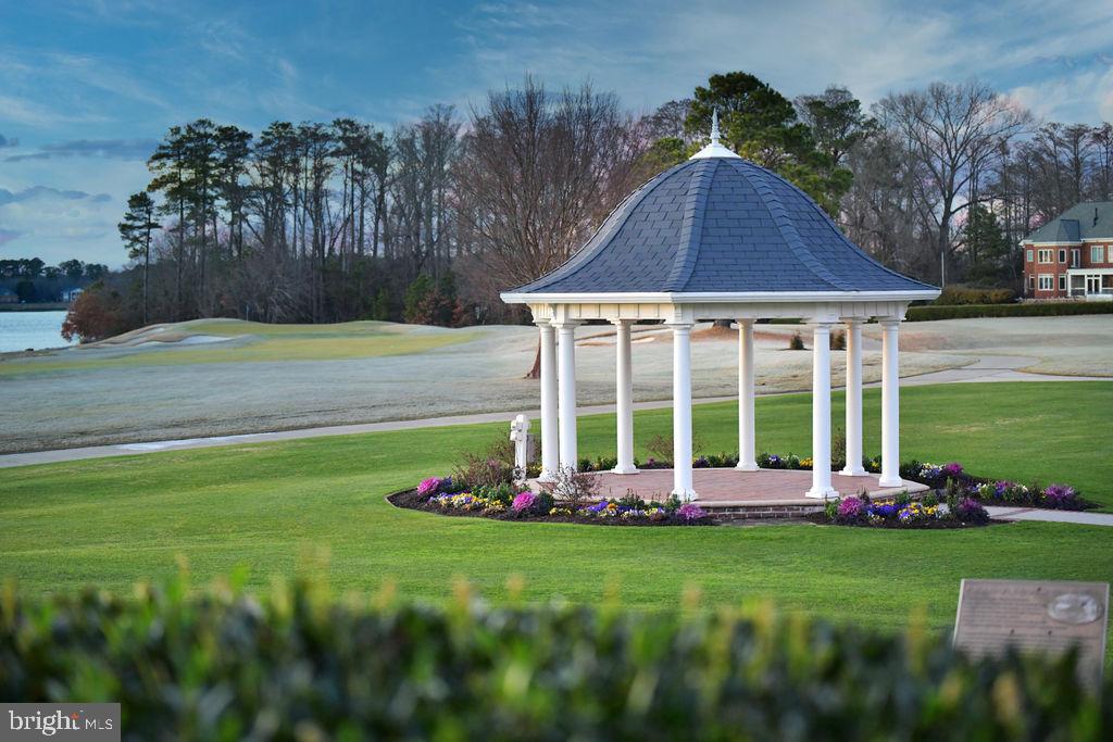 2076 Harpers Mill Road Williamsburg, VA 23185 - Photo 58 of 63 a view of a house with a yard