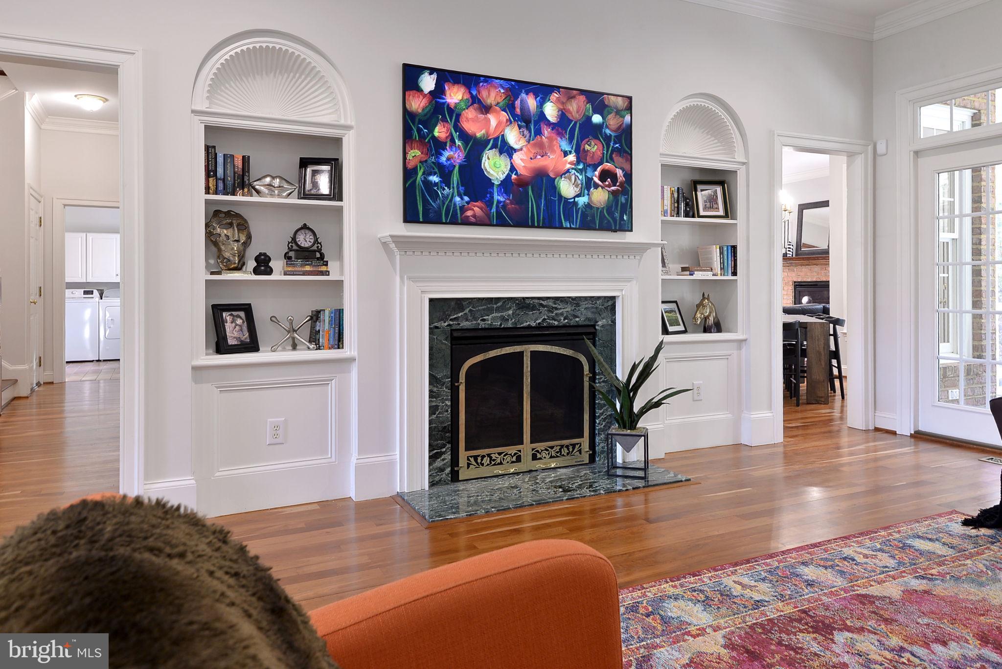 2076 Harpers Mill Road Williamsburg, VA 23185 - Photo 8 of 63 a living room with furniture and a fireplace