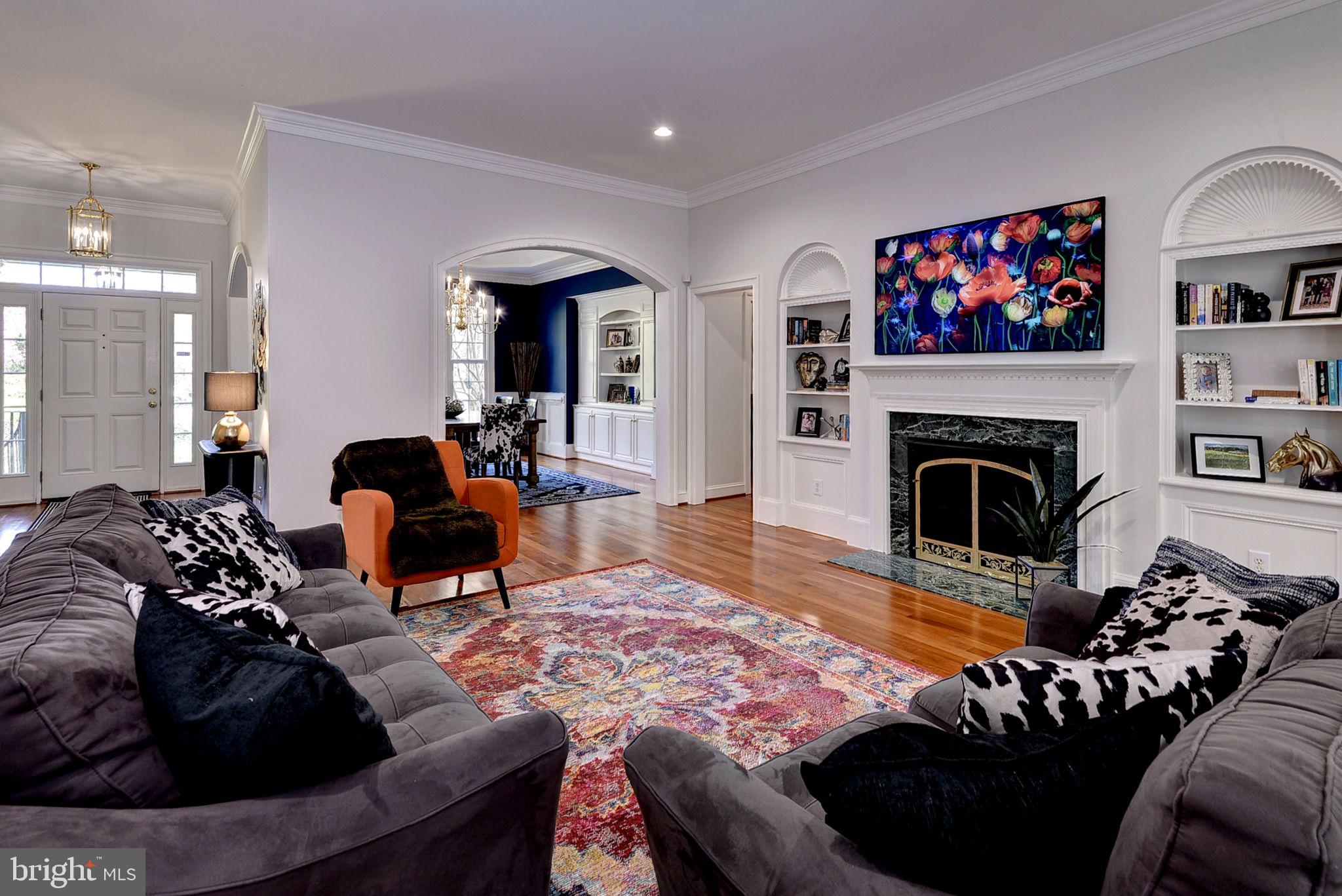 2076 Harpers Mill Road Williamsburg, VA 23185 - Photo 10 of 63 a living room with furniture or couch and a fireplace