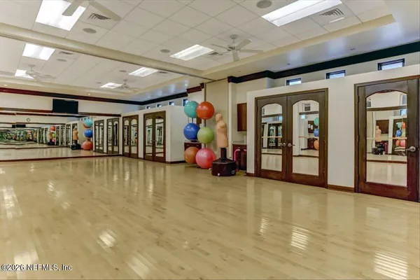 a view of a room with gym equipment
