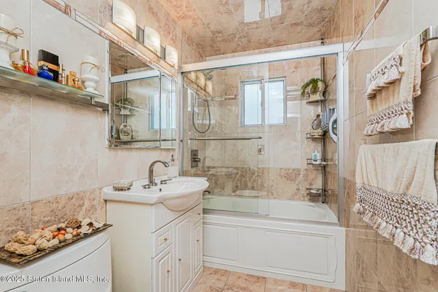 a bathroom with a sink and a bathtub