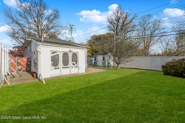 a view of a backyard with a garden