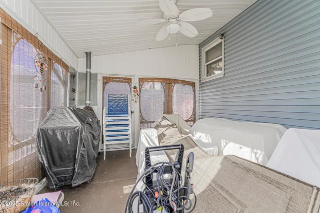 a view of a livingroom with furniture