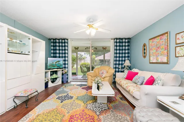 a living room with furniture and a table