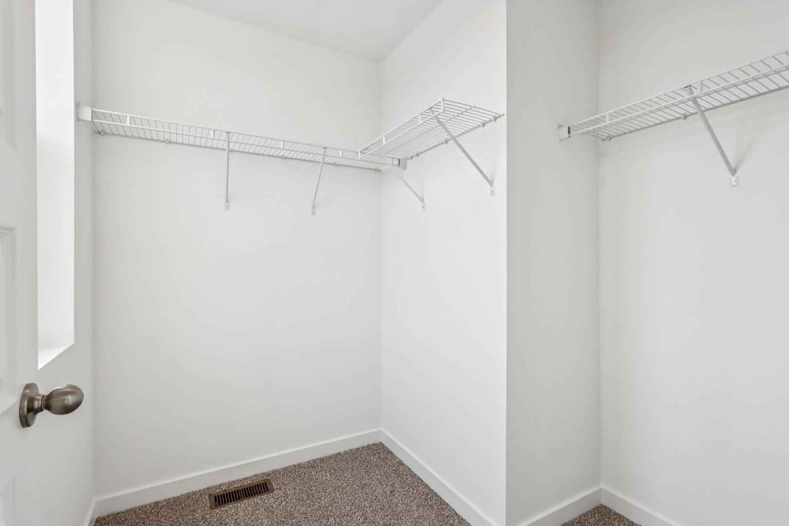 385 Summit Circle Lombard, IL 60148 - Photo 17 of 40 a view of a room with racks on the wall