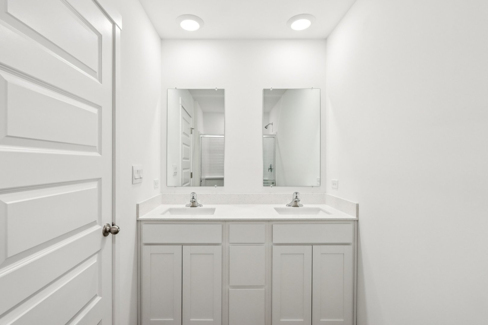 385 Summit Circle Lombard, IL 60148 - Photo 20 of 40 a bathroom with a double vanity sink and a mirror