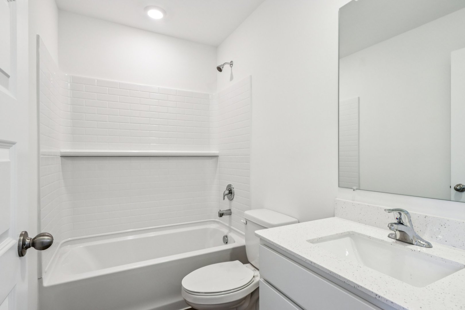 385 Summit Circle Lombard, IL 60148 - Photo 26 of 40 a bathroom with a bathtub shower sink vanity and toilet