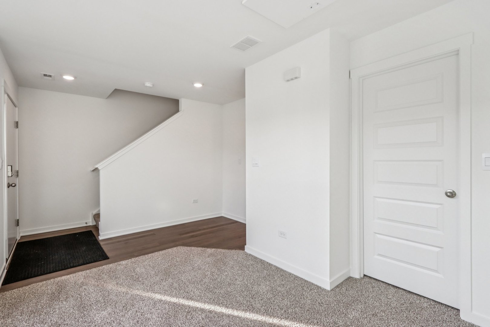 385 Summit Circle Lombard, IL 60148 - Photo 6 of 40 a view of hallway with a rug and a window