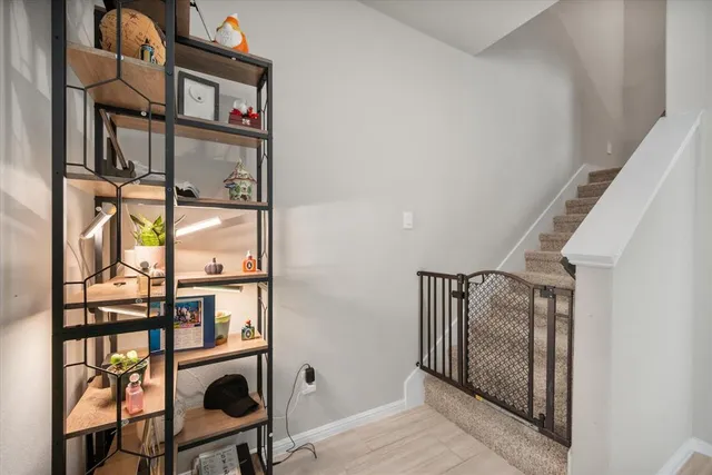 a view of a living room and bathroom