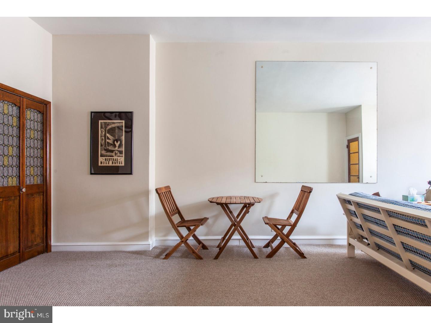 1323 Reed Street Philadelphia, PA 19147 - Photo 4 of 15 a view of a dining room with furniture and a window