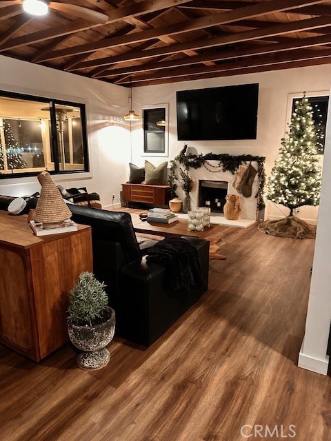 6597 Mesquite Springs Road Twentynine Palms, CA 92277 - Photo 11 of 44 a kitchen with stainless steel appliances kitchen island granite countertop a stove and a wooden floor
