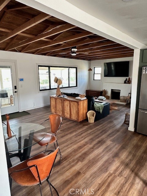 6597 Mesquite Springs Road Twentynine Palms, CA 92277 - Photo 13 of 44 a living room with stainless steel appliances furniture or kitchen view and a wooden floor