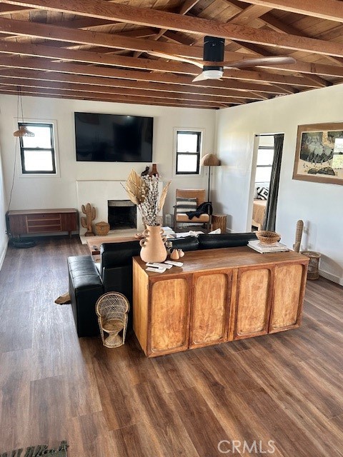 6597 Mesquite Springs Road Twentynine Palms, CA 92277 - Photo 14 of 44 a living room with furniture and a flat screen tv