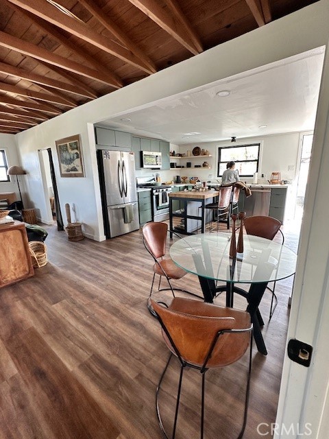 6597 Mesquite Springs Road Twentynine Palms, CA 92277 - Photo 18 of 44 a dining room with furniture and wooden floor
