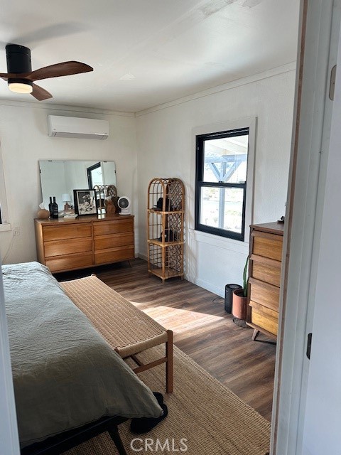 6597 Mesquite Springs Road Twentynine Palms, CA 92277 - Photo 22 of 44 a bedroom with furniture and a window