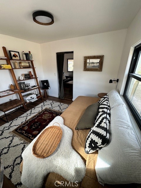 6597 Mesquite Springs Road Twentynine Palms, CA 92277 - Photo 25 of 44 a bedroom with a bed and a flat screen tv