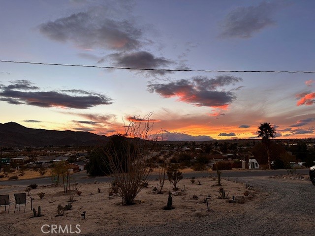 6597 Mesquite Springs Road Twentynine Palms, CA 92277 - Photo 37 of 44 a view of a sky