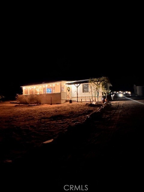 6597 Mesquite Springs Road Twentynine Palms, CA 92277 - Photo 39 of 44 a view of an ocean from a yard
