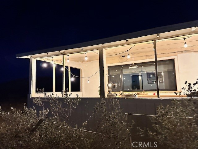 6597 Mesquite Springs Road Twentynine Palms, CA 92277 - Photo 9 of 44 a view of a building with a entrance