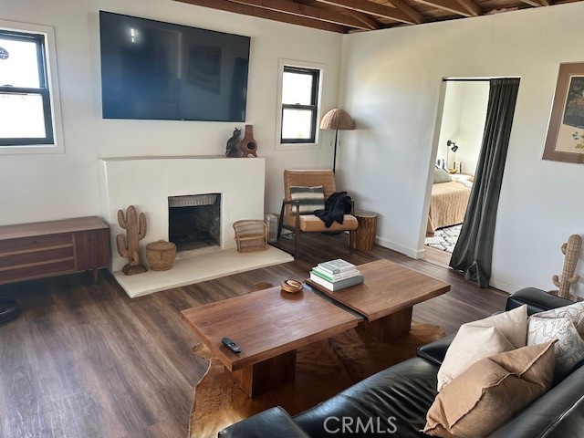 6597 Mesquite Springs Road Twentynine Palms, CA 92277 - Photo 10 of 44 a living room with furniture and a fireplace