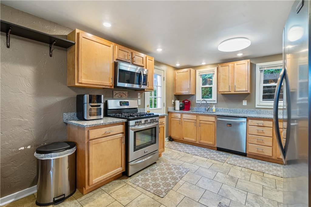 3408 Willett Road Pittsburgh, PA 15227 - Photo 12 of 34 Kitchen & Dining area located on the main floor is 20x10