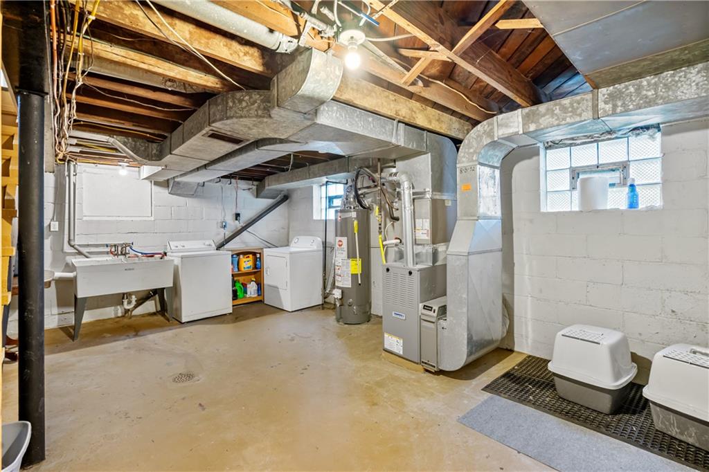 3408 Willett Road Pittsburgh, PA 15227 - Photo 25 of 34 Basement is 20x14 and has a door that leads to the 1 car integral garage